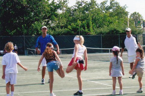 Streching on the tennis court